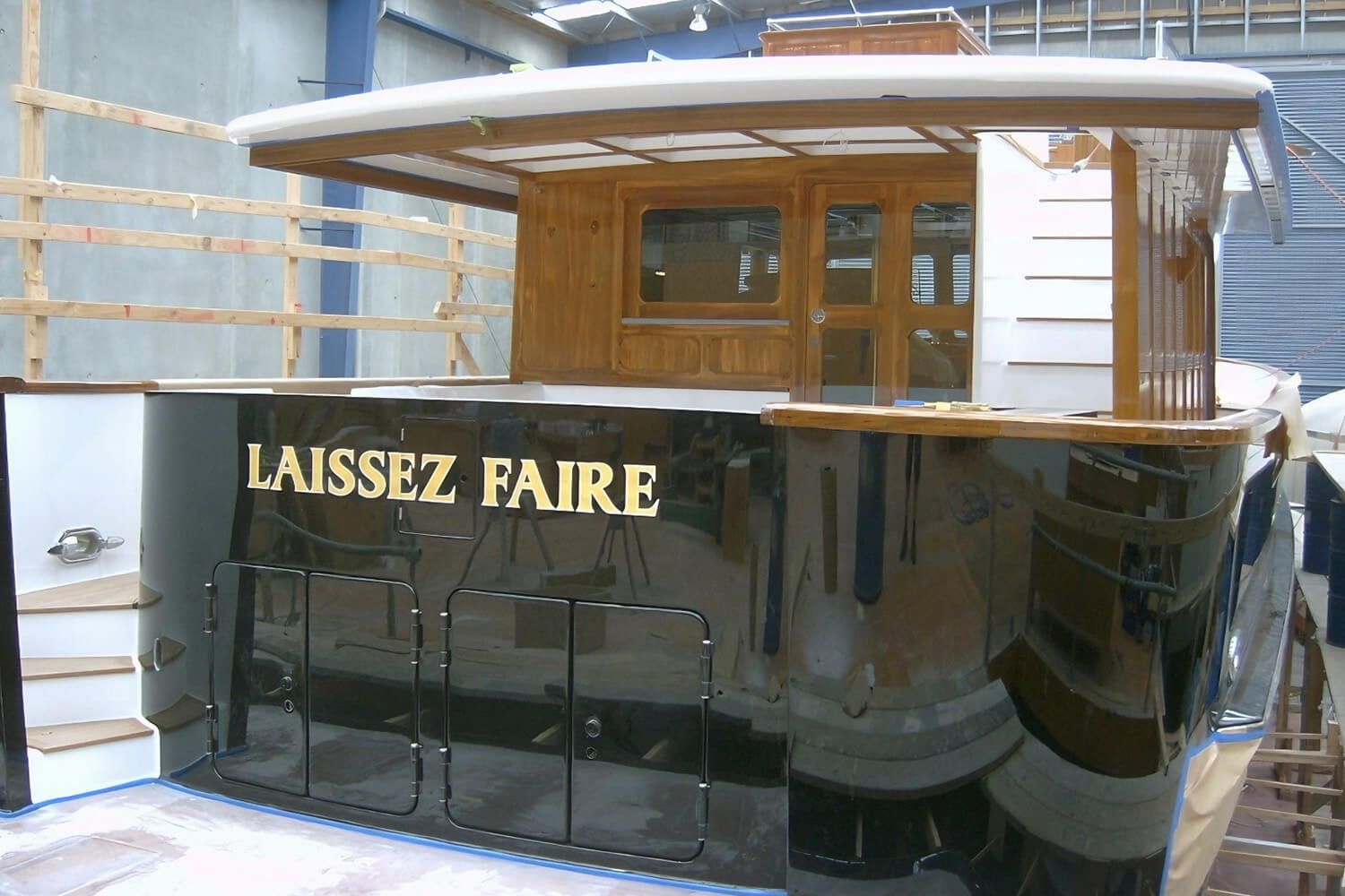 Laissez Faire repaint and new teak deck planking